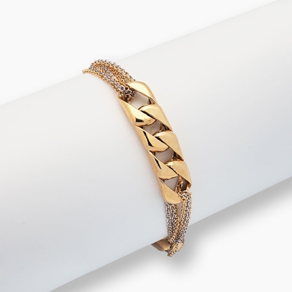 Pulsera barbada con cadenitas realizada en oro amarillo y blanco de primera ley