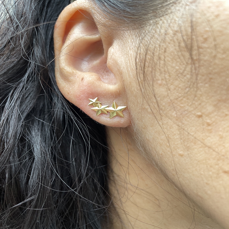 Pendientes trepadores estrellas en oro amarillo 2