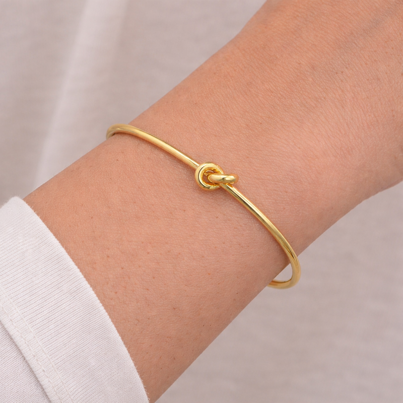 Pulsera rígida nudo en oro amarillo 2