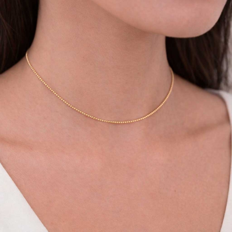 Gargantilla rígida de bolitas en oro amarillo 2