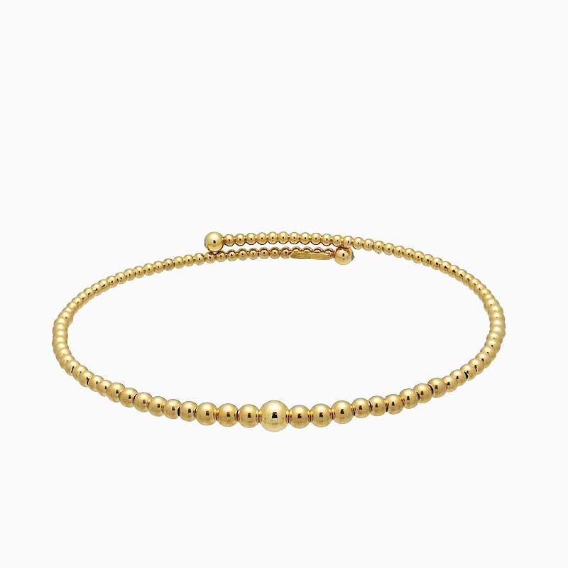 Pulsera rígida de bolitas en oro amarillo