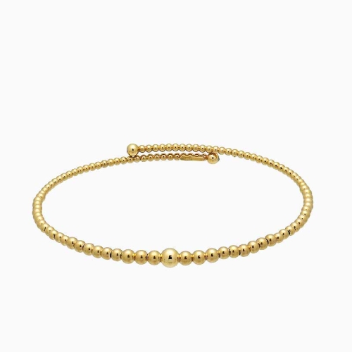 Pulsera rígida de bolitas en oro amarillo