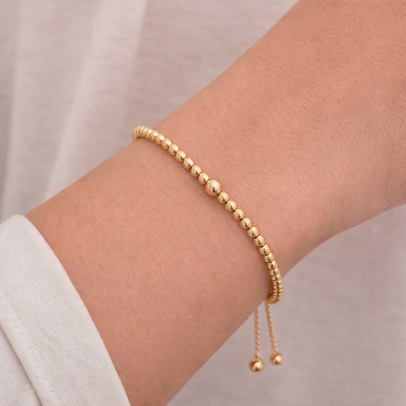 Pulsera rígida de bolitas en oro amarillo 2
