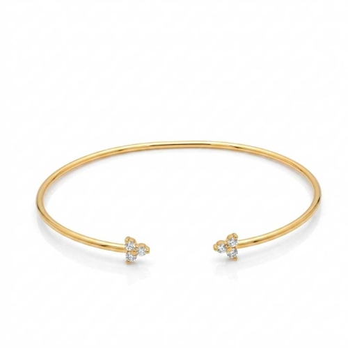 Pulsera rígida abierta en oro amarillo y circonitas