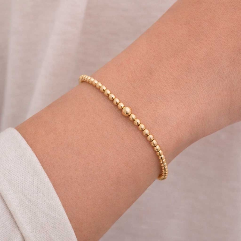Pulsera rígida de bolitas en oro amarillo 2