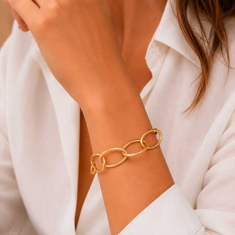 Pulsera ancha de grandes eslabones en oro amarillo de 18k en terminación mate y brillo. 2