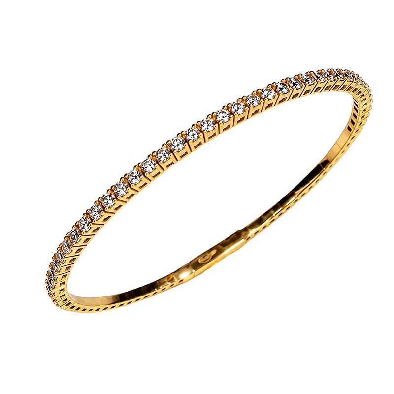 Pulsera rígida de oro amarillo y circonitas