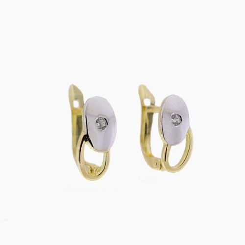 Juego en oro de 18k bicolor con piezas en forma de gota y circonitas